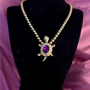 Vintage gold toned Turtle Pendant/broach Necklace and earrings with Purple Stone
